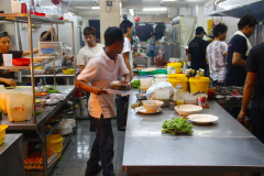 Malaysia, Kuala Lumpur,  Jalan Alor Food Street, Hektik in der Küche