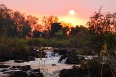 Namibia, Sonnenuntergang an den Popa Falls